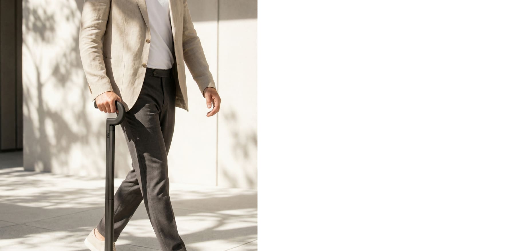 A man walking with the Rise cane